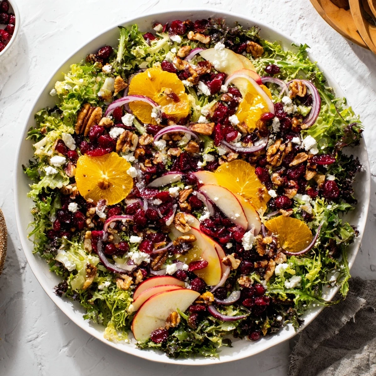 Bright Seasonal Cranberry and Walnut Celebration Salad, featuring glistening fresh cranberries, ready to serve.