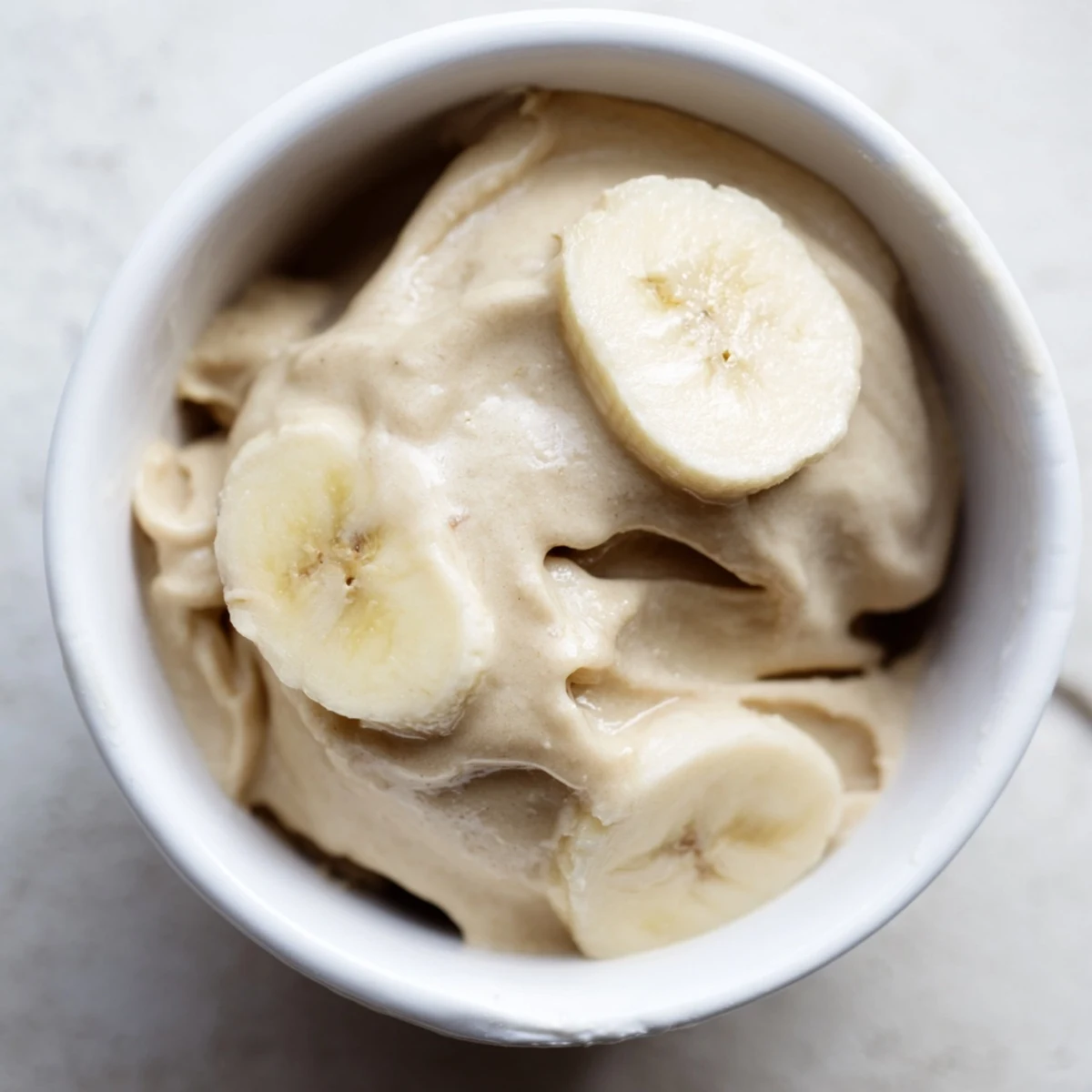 Creamy 2-Ingredient Banana Ice Cream, a naturally sweet frozen dessert perfect for a quick snack.