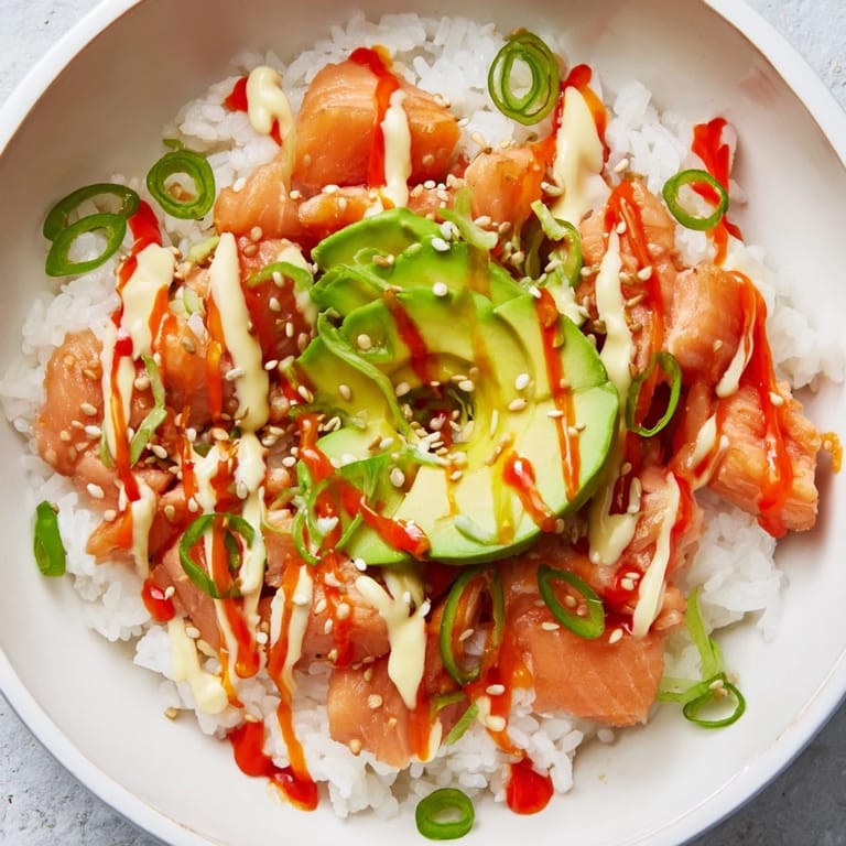 Quick and easy—this Classic Salmon Rice features soy sauce-infused rice beneath the delightful salmon.