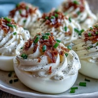 Everything bagel deviled eggs with creamy filling and savory topping.